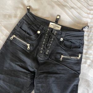 Saint Laurent pairs black jeans flares